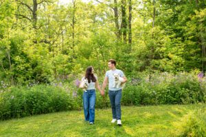Couple walking together with their dogs at Rock Glen Conservation Area.