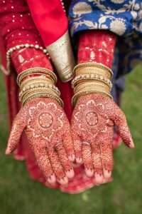 Detail of henna tattoos on brides hands.