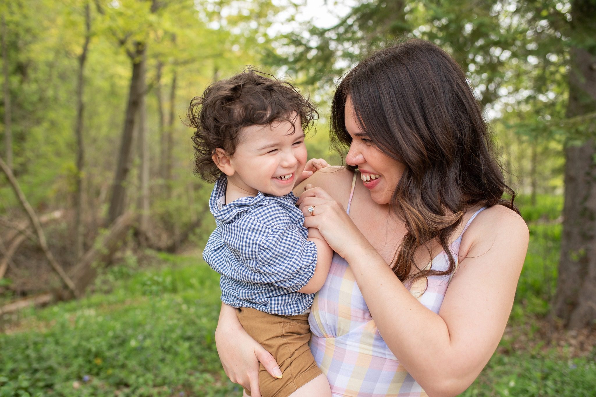 Mom cuddling toddler boy at Springbank Gardens