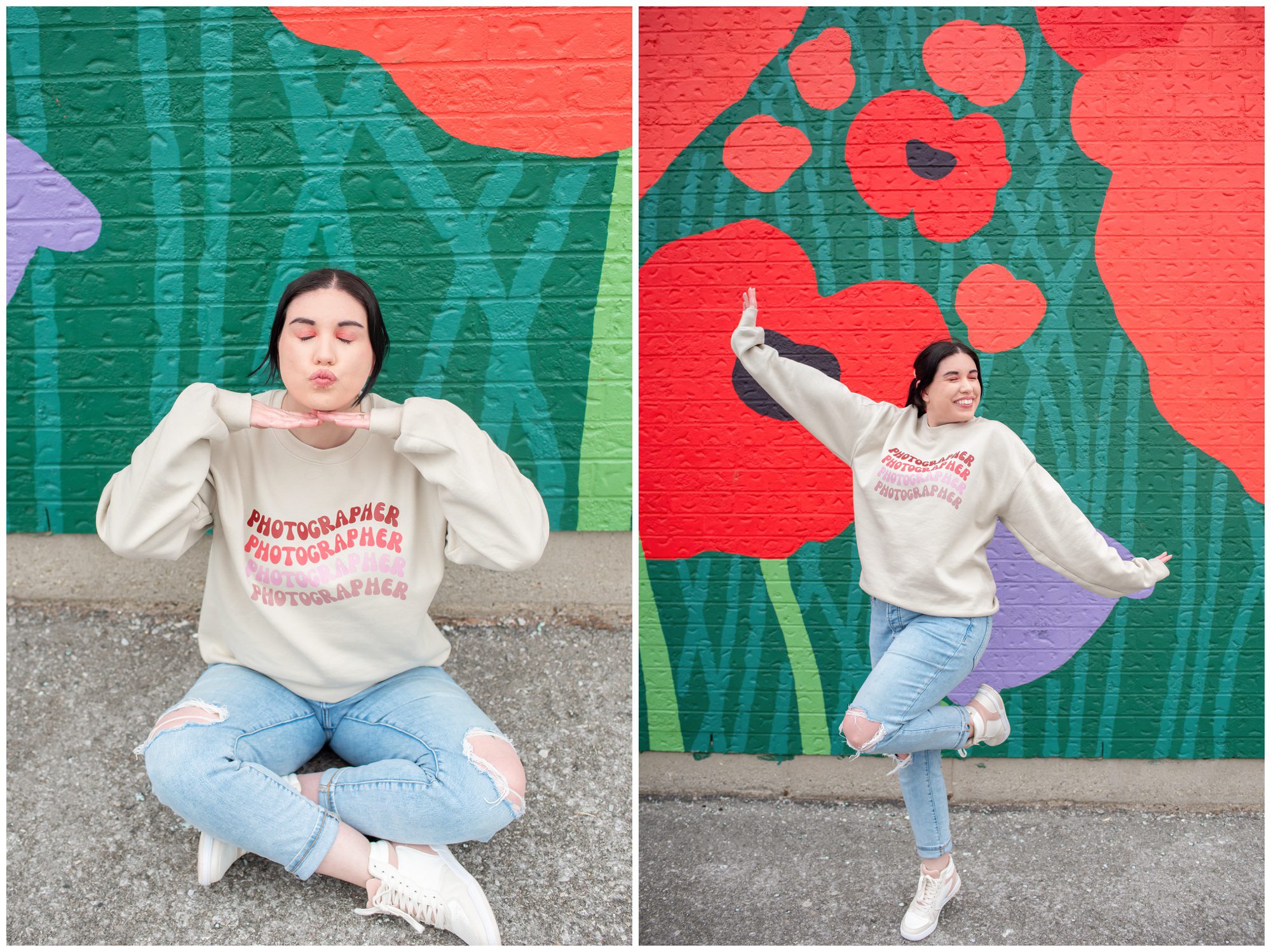 Michelle of Michelle A Photography wearing a photographer sweater in front of a poppy mural in St Thomas Ontario