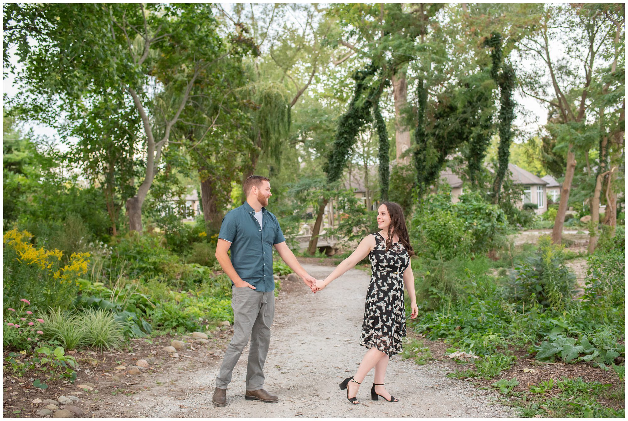 Couple holding hands at Lakeside Park in Kingsville Ontario.