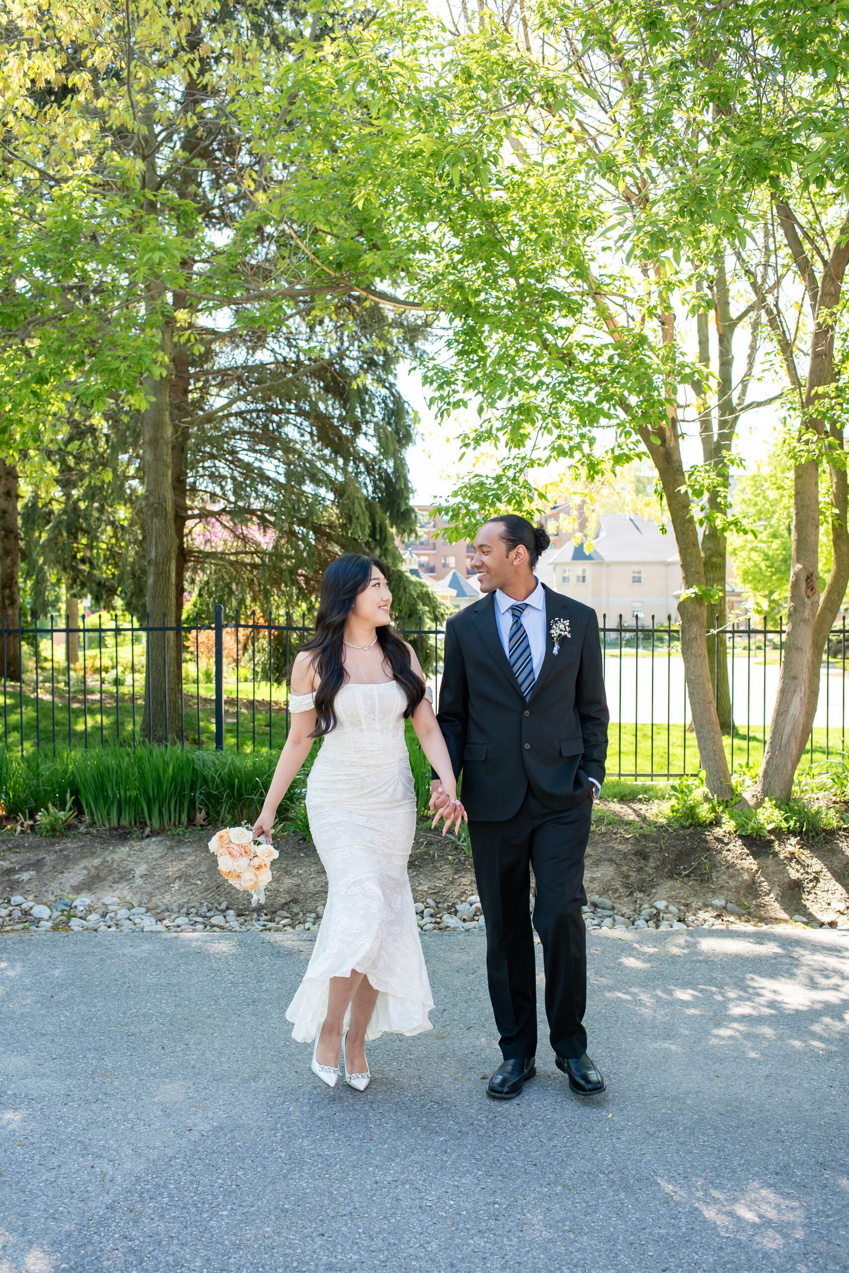 Couple walking hand in hand at Idlewyld Inn and Spa in London Ontario